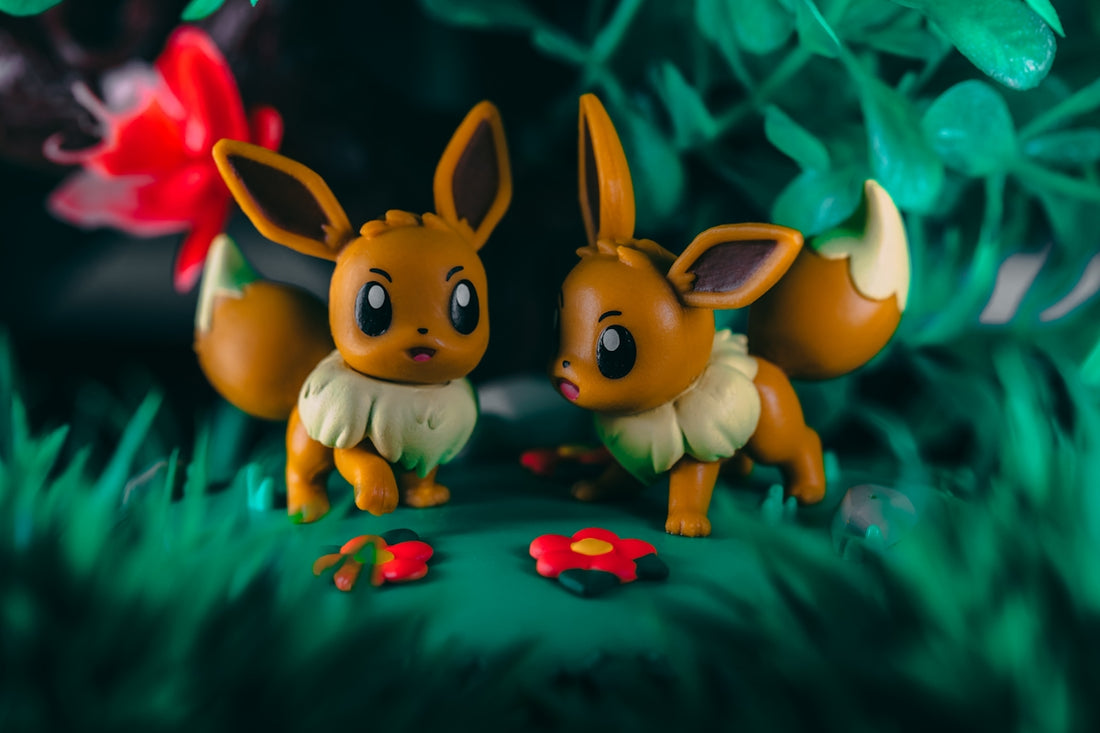 a group of yellow and orange toy animals