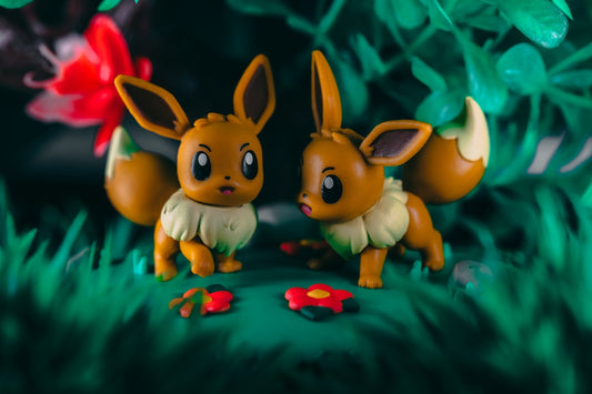 a group of yellow and orange toy animals