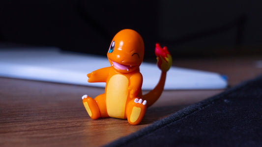 A small toy sitting on top of a wooden table