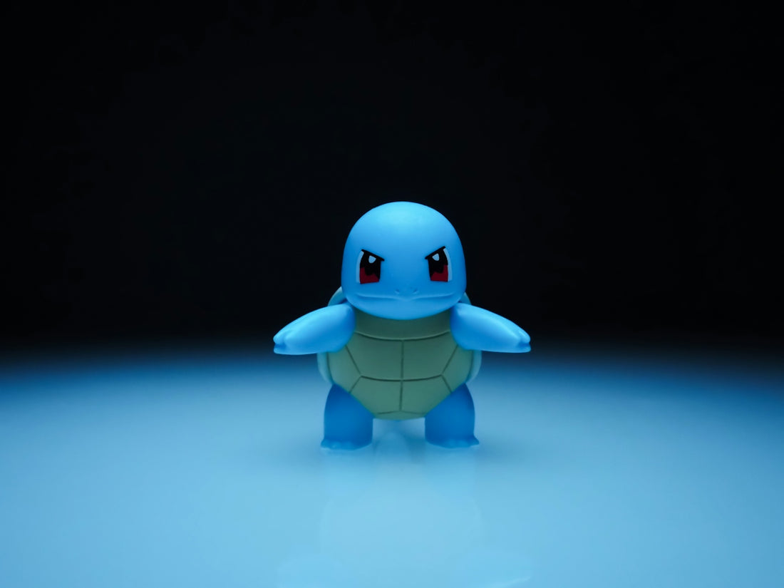 Squirtle stands proudly on a blue surface.